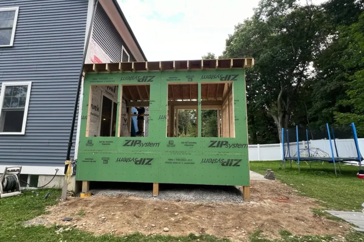 New foundation and floor framing for a first-floor home addition in Reading, MA