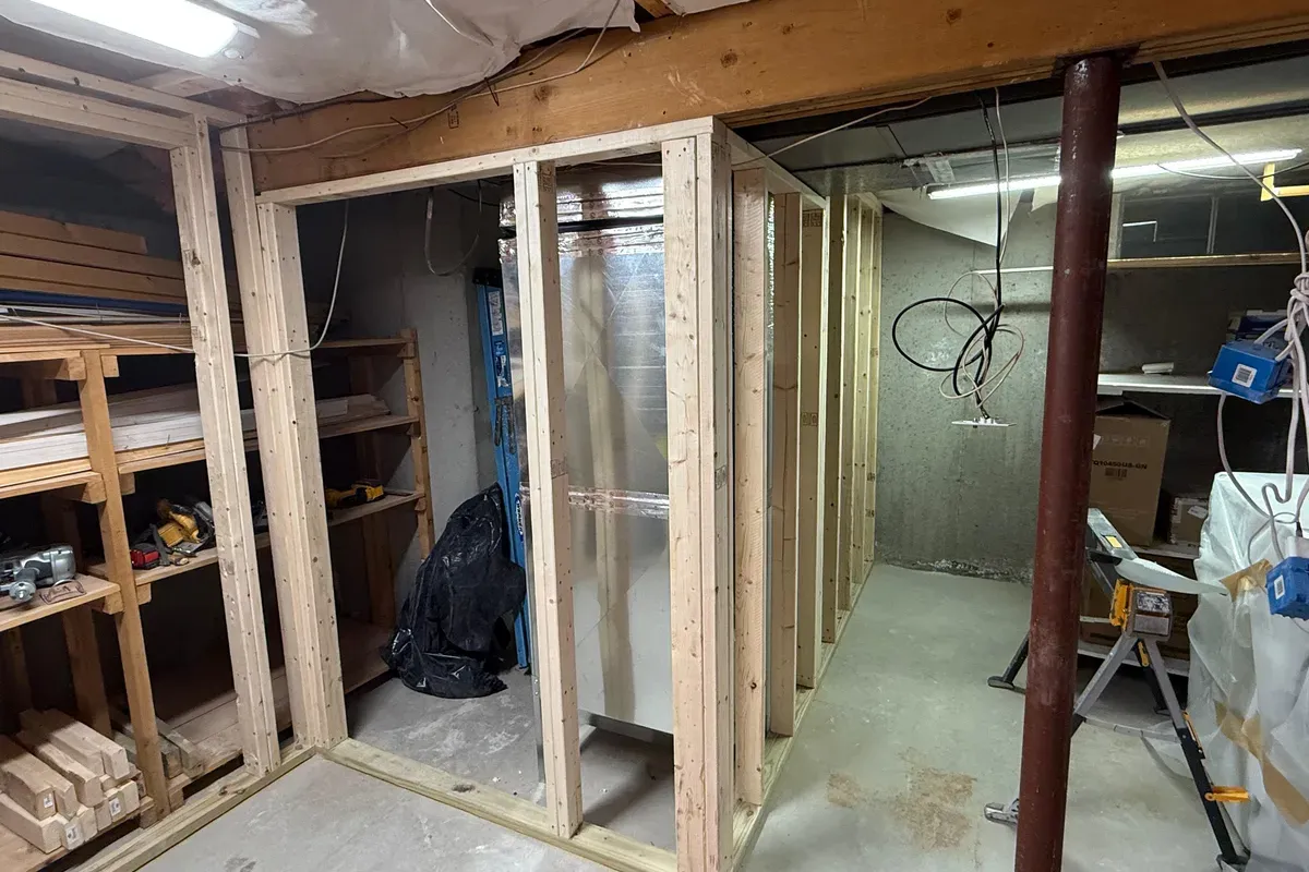 Basement framing in progress before insulation and drywall, Innov Builders project in Ashland, MA
