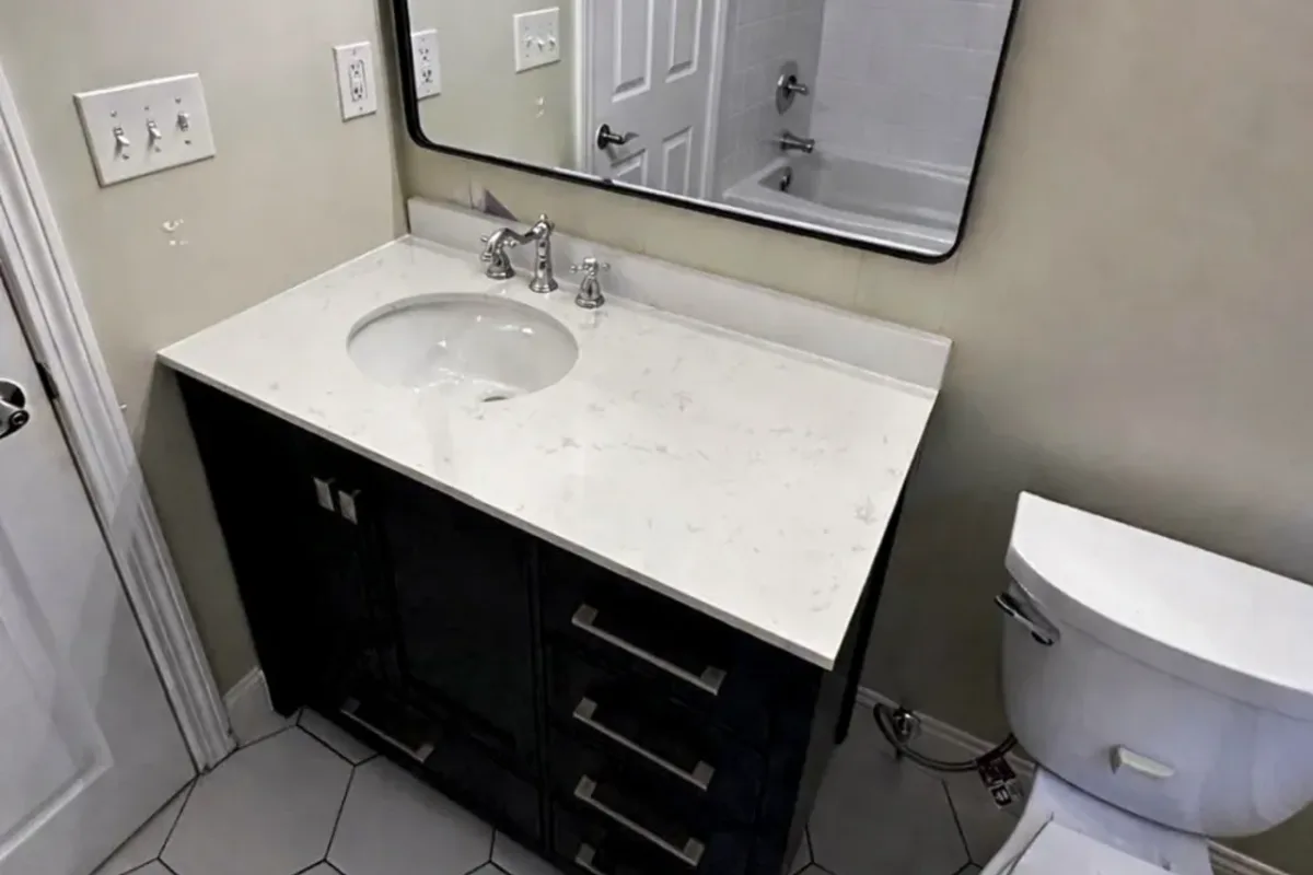 Modern vanity and tile in a finished Woburn, MA bathroom remodel by Innov Builders in-house crew