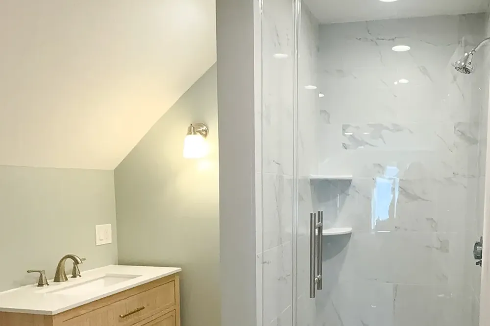 Completed bathroom remodel with permits handled by Innov Builders in Wakefield, MA