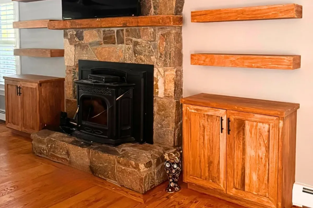Custom built-in entertainment center and media wall installed by Innov Builders in a Reading, MA family room