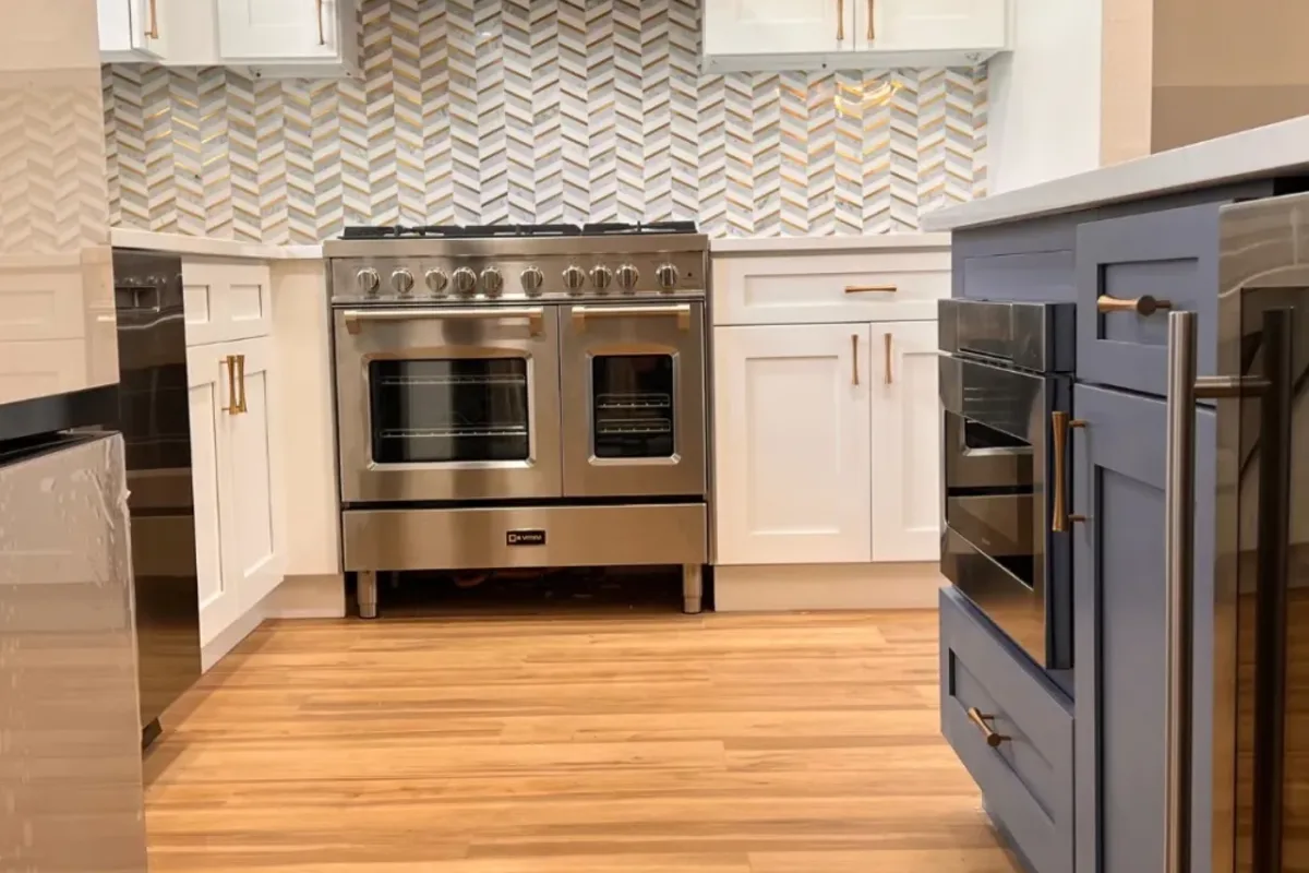 Detail of new cabinets, backsplash and countertops in a Wakefield, MA kitchen remodeled by Innov Builders
