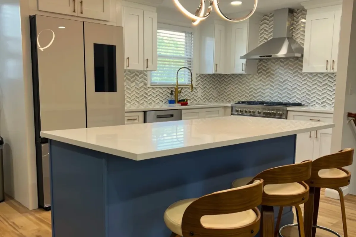 Custom kitchen island with seating in a North Reading, MA kitchen remodel by Innov Builders