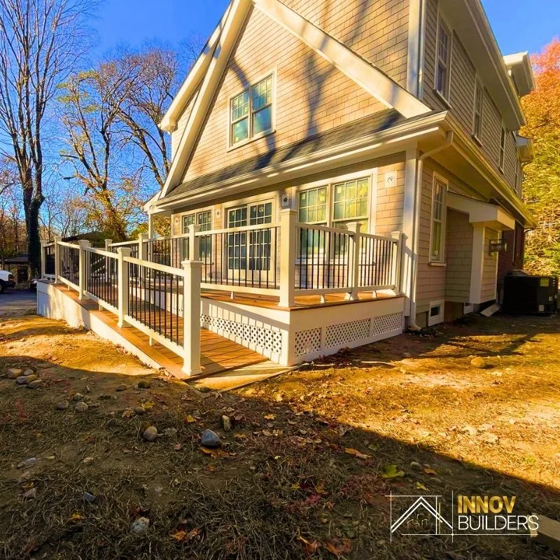 Deck remodeling project with custom railing and ramp on a North Shore home